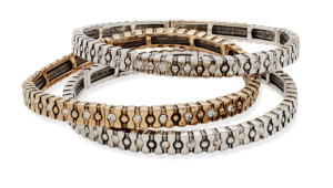 Premier Design's Gleam Bracelets. #armcandy #armparty #stackedbracelets #stretchybracelets #goldandsilverjewelry